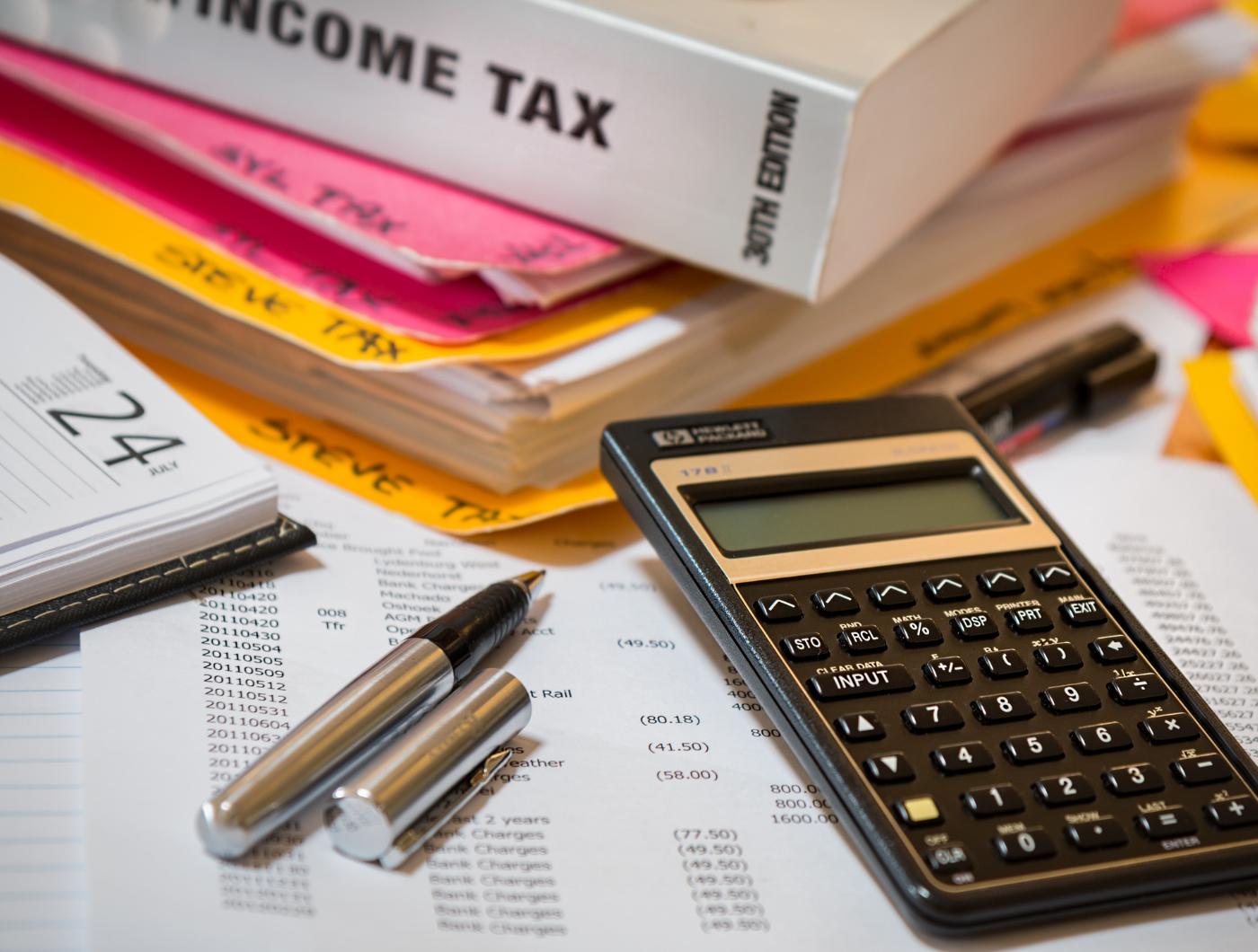 Bookkeeping professional maintaining organised financial records