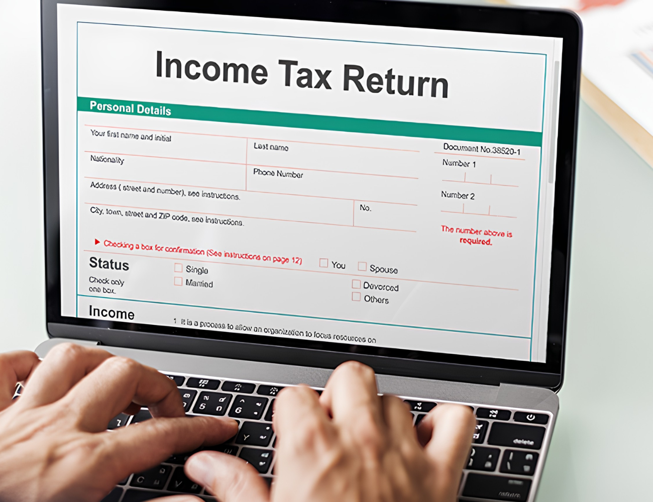 Tax consultant reviewing income tax documents