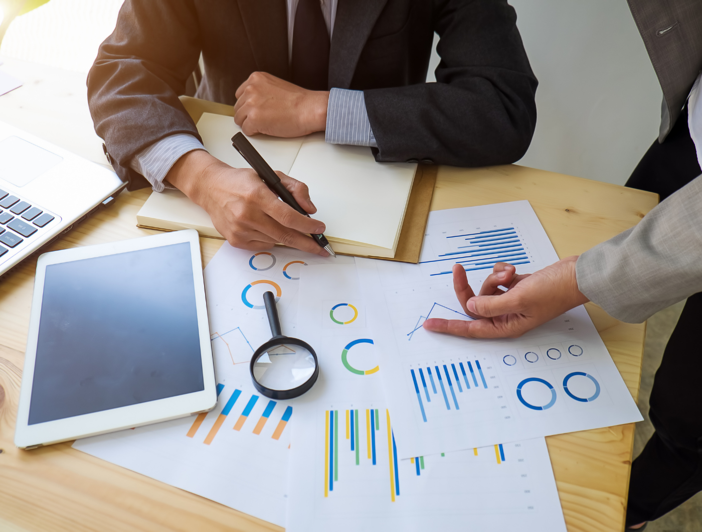 Internal and stock audit professionals reviewing financial records and inventory